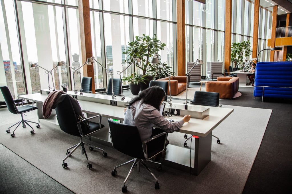 Modern office space with ergonomic furniture designed to boost productivity.