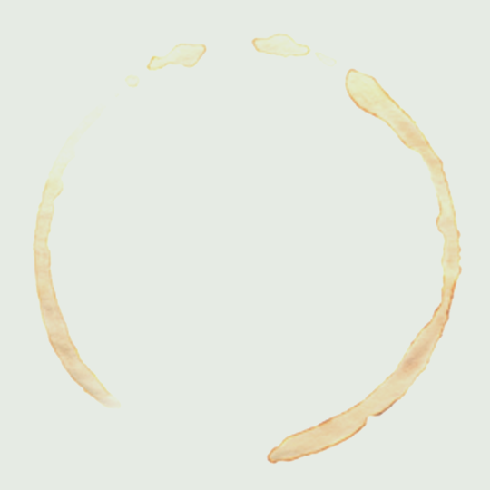 Bild im Aquarellstil, das einen kreisförmigen Kaffeefleck mit hellbrauner Farbe auf weißem Hintergrund darstellt. Der Fleck hat eine unregelmäßige Kontur mit einigen kleinen Tröpfchen über dem Hauptkreis, die ein nachhaltiges Büro symbolisieren. Ein Bild von EDGE Workspaces.